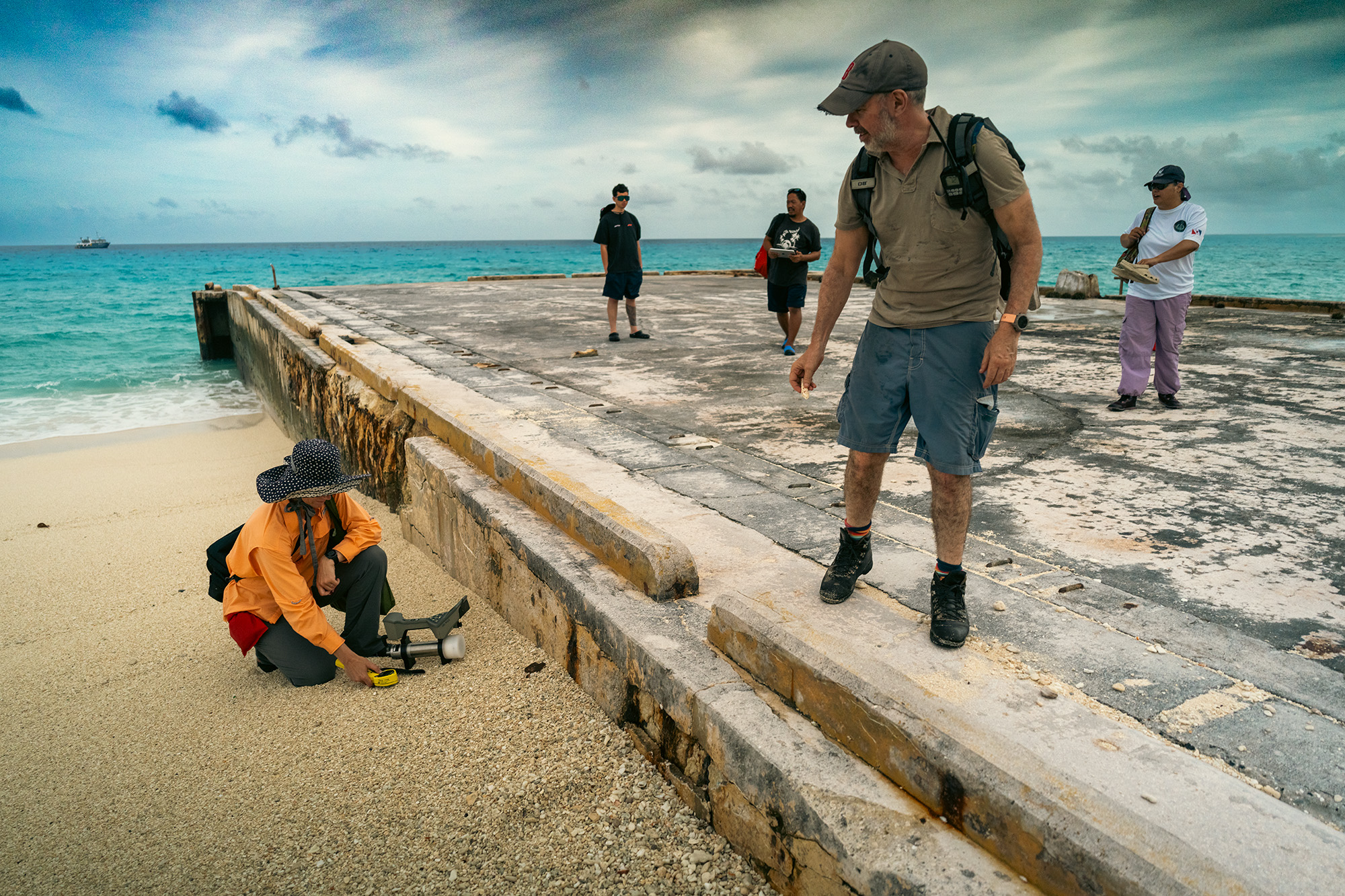 Dr Robin Elgart takes a radiation reading at Enyu Island, Bikini Atoll