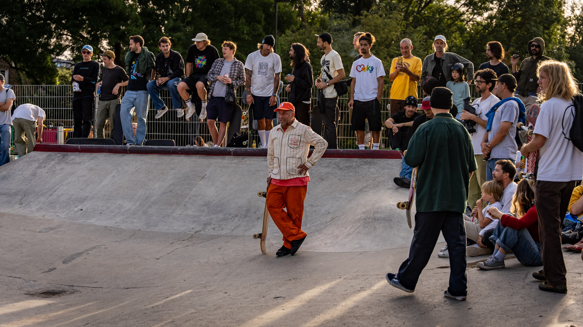 Mark Gonzales standing with his board in the middle of the crowd at Hackney Bumps